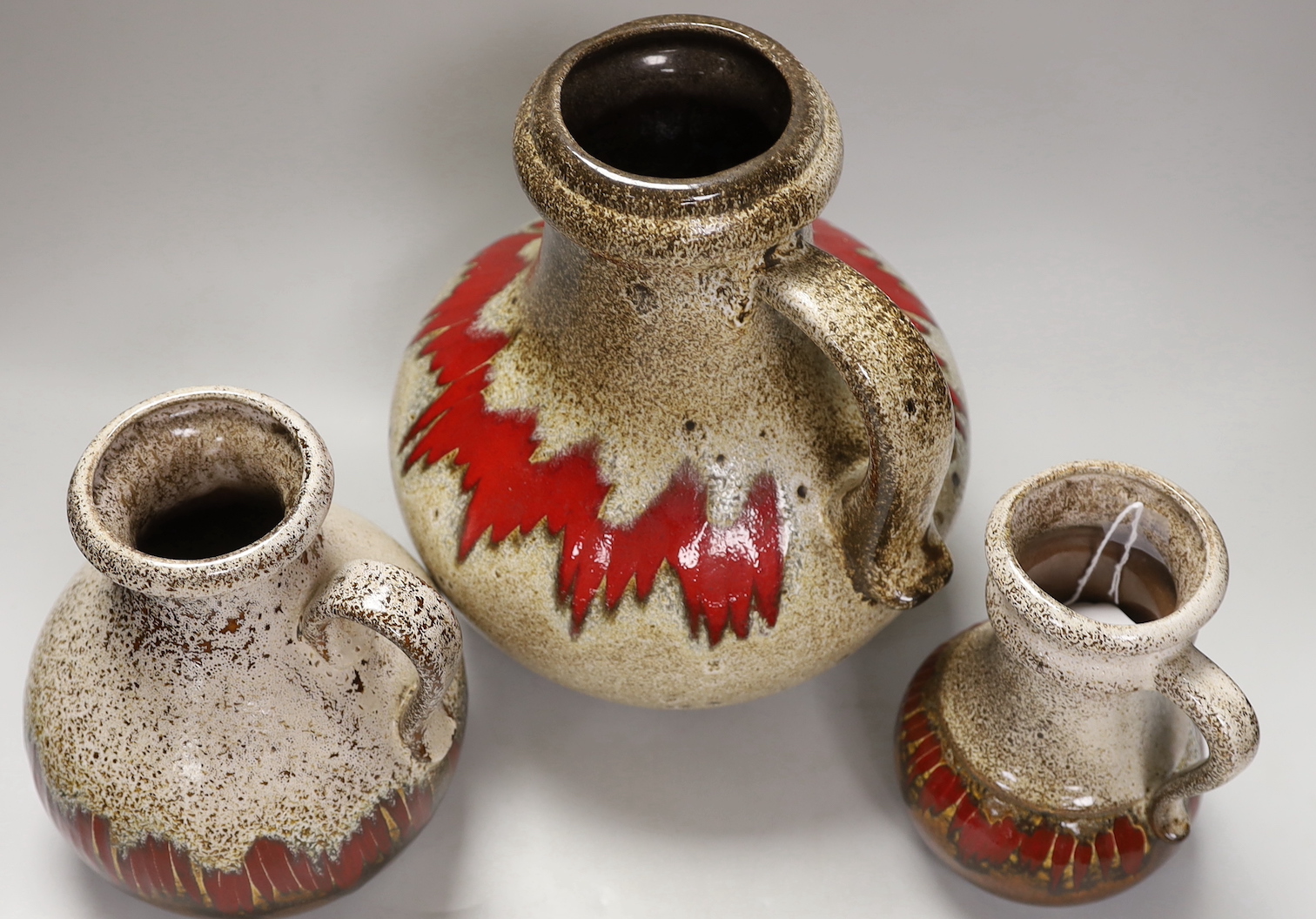 Two Scheurich Keramik jugs and a vase, tallest jug 28cm high
